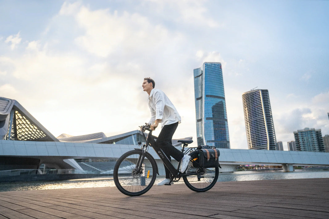 DYU C5 city e-bike ridden near a waterfront for tire pressure setup