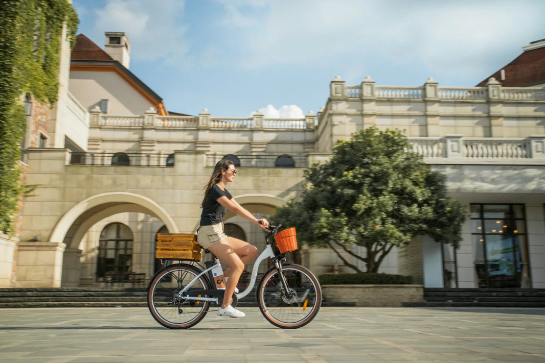 DYU C6-Pro city e-bike ridden through a historic square