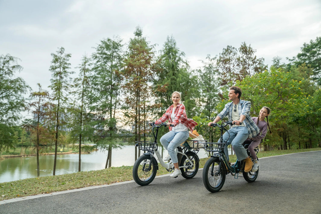 DYU C9 folding e-bike family ride in a lakeside park
