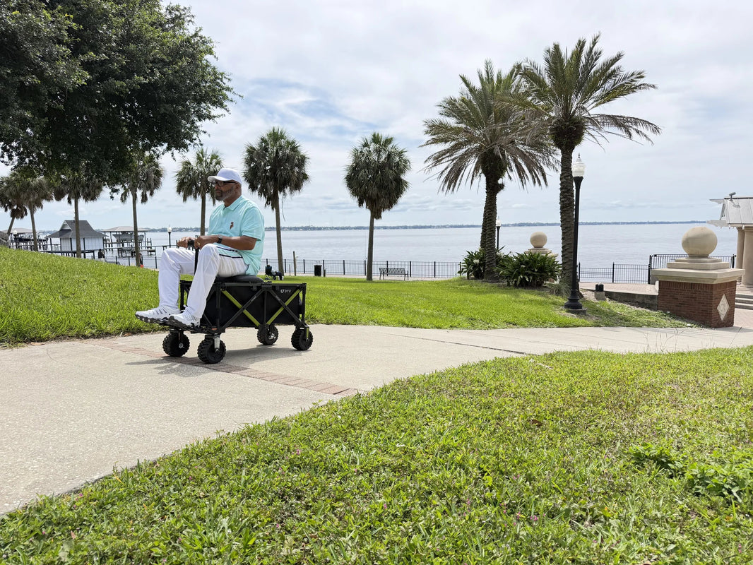 DYU campX electric wagon cruising through a US waterfront park